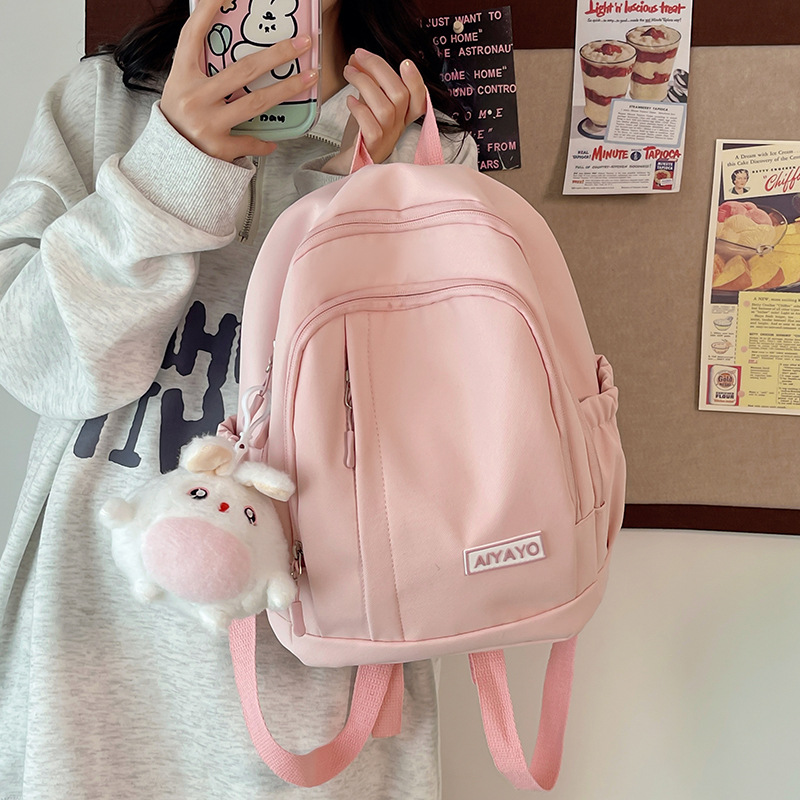 The new schoolbag is a simple solid-color small backpack for female college students. It features a Japanese Instagram style, a soft and cute girl, and mini shoulders details Picture