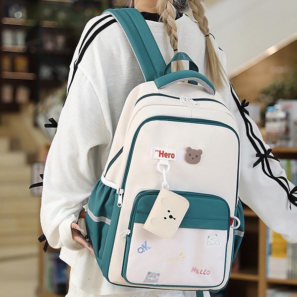 A new Korean version of the forest-themed ins fresh and sweet color-blocking backpack, a lightweight and large-capacity backpack for junior and senior high school students details Picture