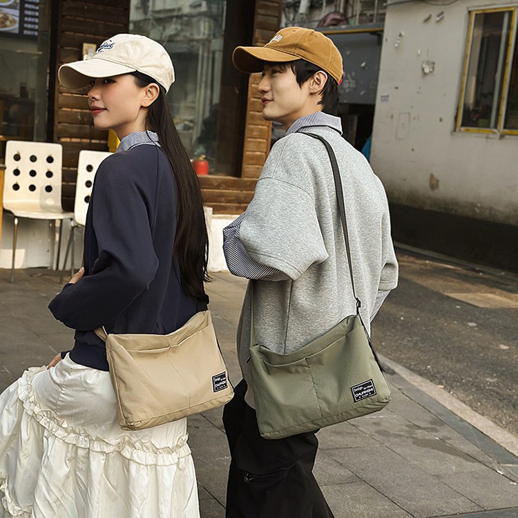2025 New style casual and simple underarm small bag, Japanese lightweight solid color nylon crossbody single-shoulder fabric bag, artistic bag details Picture