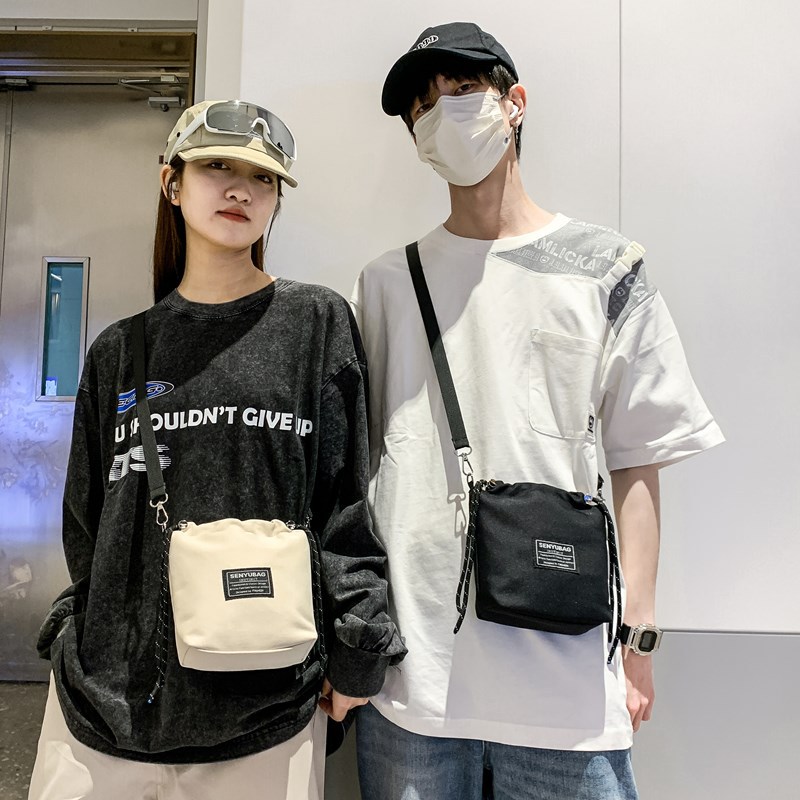Korean style Instagram streetwear brand personalized crossbody bag with drawstring closure, outdoor sports small bag, cool couple's dancing shoulder bag full figure