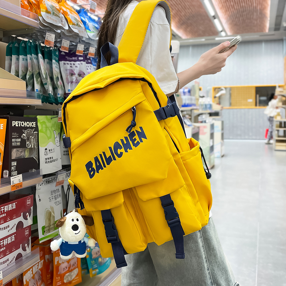 A new Korean-style ins high-look, fresh candy-colored letter backpack, a simple and lightweight backpack for junior and senior high school students full figure