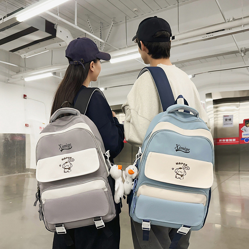 A new high-appearance-level color-blocking high school student backpack, a Korean-style Instagram trendy and versatile casual backpack for college students and couples details Picture