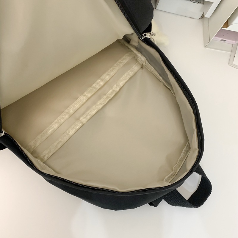 Cute cartoon backpack for girls, Korean version of long-eared bear, junior high school student doll backpack, and schoolbag for grades three to six of primary school students Application Scenario