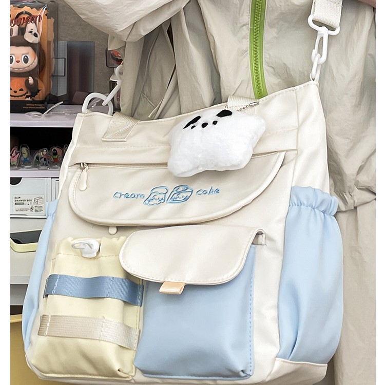 A cute Japanese-style large-capacity crossbody bag with contrasting colors, a versatile and casual tutorial bag for junior and senior high school students to carry on their way to and from school details Picture