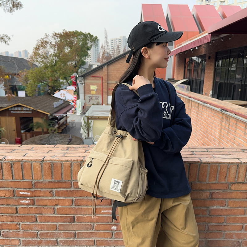 Multi-purpose drawstring drawstring bags, schoolbags, single-shoulder bags for female college students, lightweight class backpacks, and niche couple backpacks details Picture
