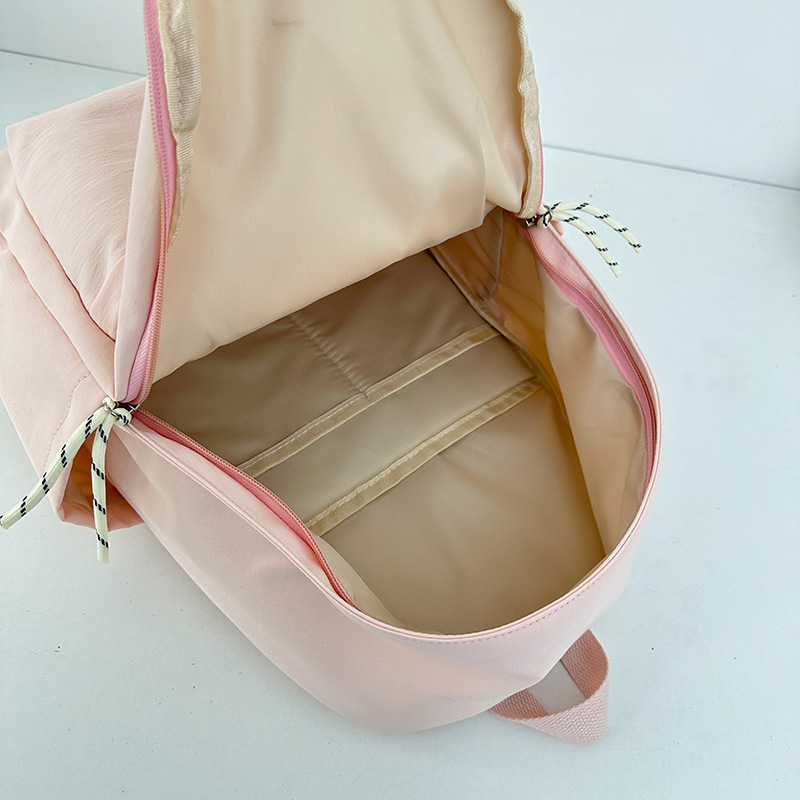 Spring new simple and versatile small schoolbag, high school girls' appearance level, sweet girl's travel mini backpack, hot mom's backpack with kids Application Scenario
