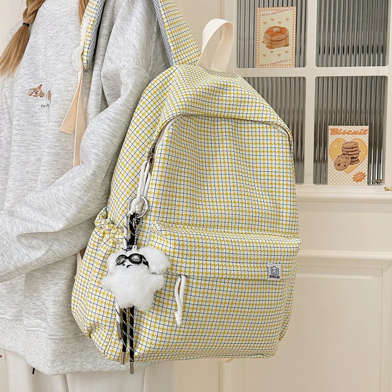 Japanese-style fresh and light backpack, large-capacity casual travel backpack, high appearance level, versatile for junior and senior high school students' schoolbags full figure