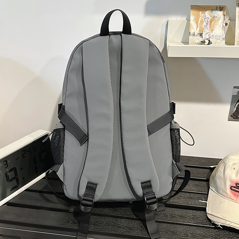 The new forest-themed ins high-appearancelevel casual retro backpack is a lightweight travel backpack for junior and senior high school students with contrasting colors Specification drawing