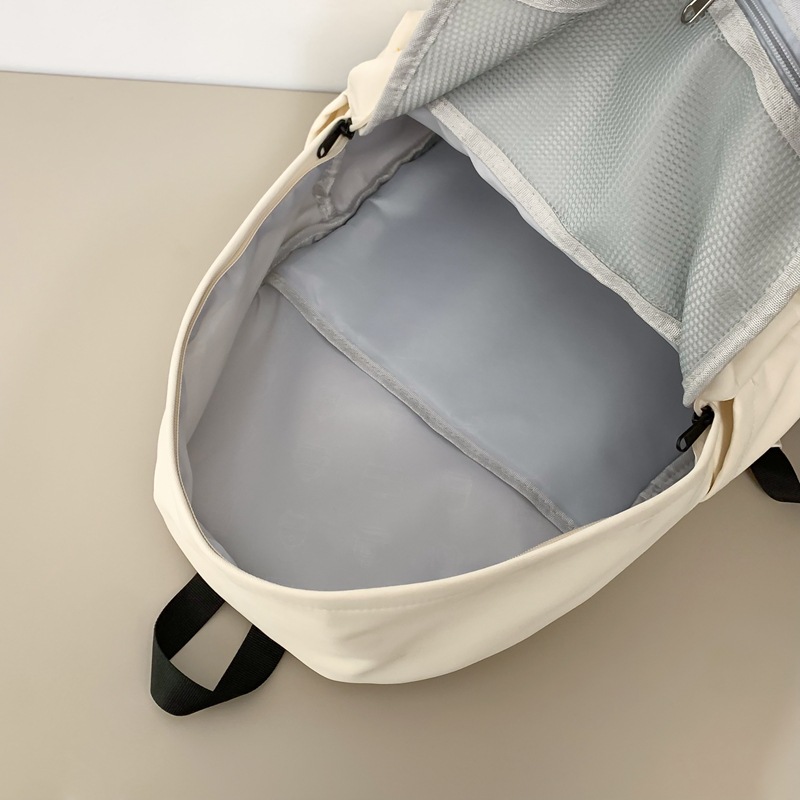 A Japanese-style Instagram niche graffiti schoolbag with high appearance standards, a cute and versatile backpack for junior high school girls, and a lightweight travel backpack Application Scenario