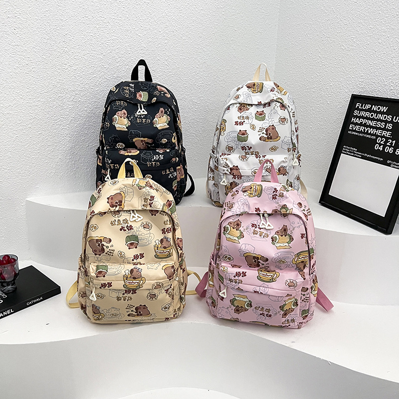 Wholesale of large-capacity backpacks for primary and secondary school students in winter 2024, featuring daily graffiti, cute cartoons and anime full figure