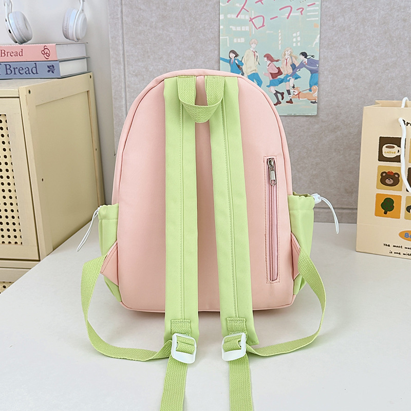 The new high-appearance-level college style fresh and cute 2D pain-pain bag with contrasting colors is a lightweight commuting backpack for primary and secondary school students Specification drawing