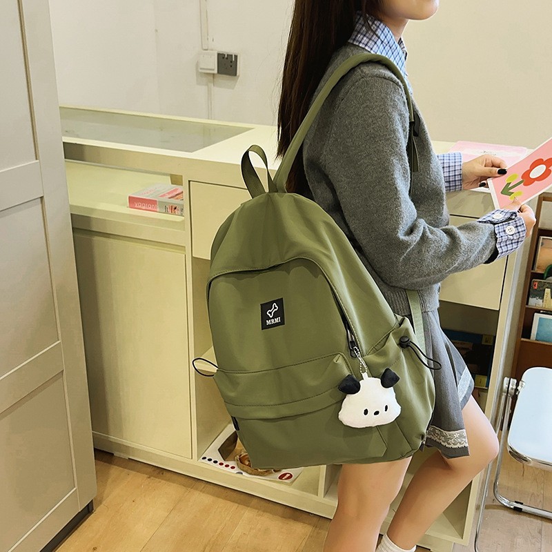 A new high-appearancelevel solid-color backpack from Korean Instagram, a casual, simple, lightweight and large-capacity backpack for middle and high school students details Picture