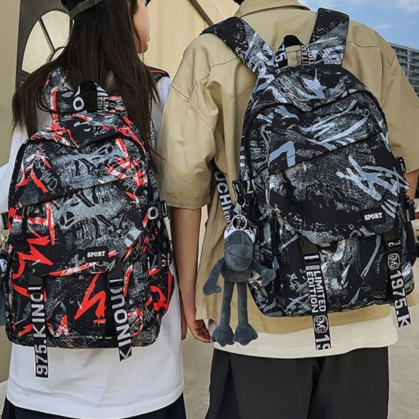 The new Korean version of Instagram, with a high level of appearance, personalized graffiti, trendy and cool backpacks, couple color contrast, lightweight and large-capacity backpacks full figure