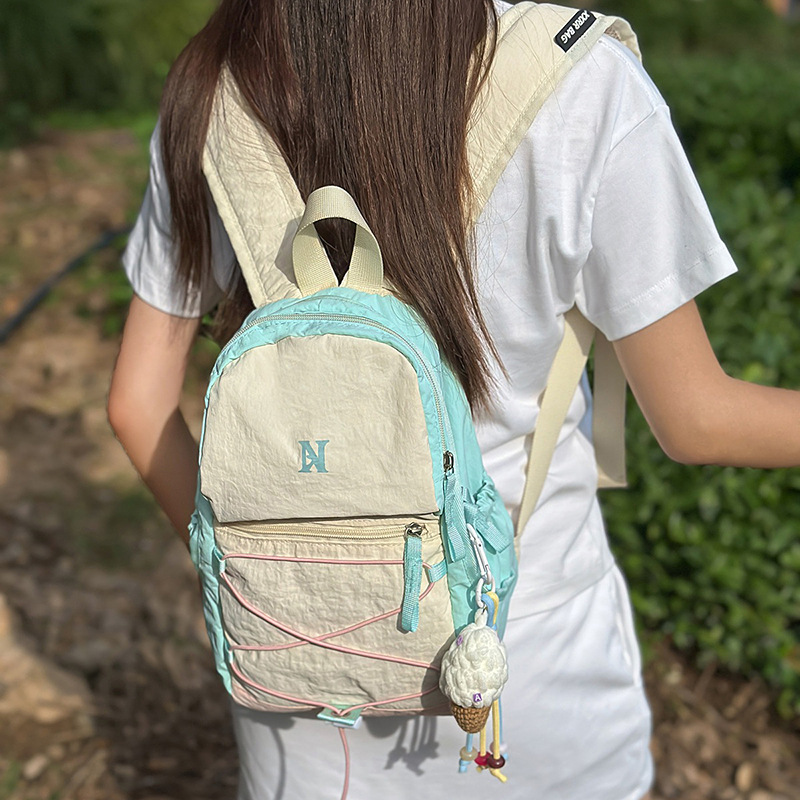 The new summer multi-color mountain-themed mini backpack features a high aesthetic level, a fresh and lightweight outdoor sports and leisure backpack full figure