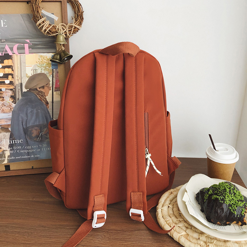 Simple and versatile casual small schoolbag, a backpack for girls in high school, college and junior high school, a lightweight backpack for commuting and traveling Specification drawing