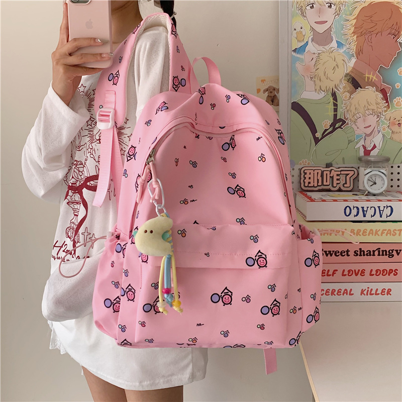 A new high-appeal, fresh and sweet campus backpack for junior and senior high school students, a lightweight and large-capacity backpack for spring outings full figure