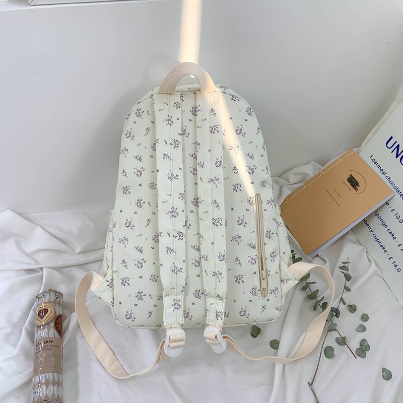 The new 2025 fresh and cute floral backpack is a simple, lightweight and versatile large-capacity backpack for high school and junior high school students, suitable for daily commuting Specification drawing