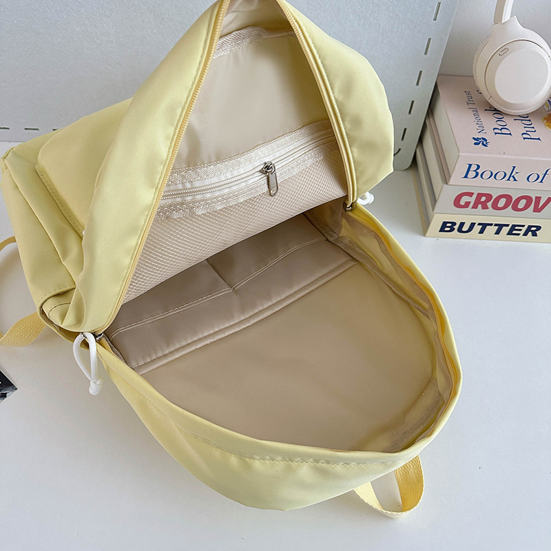 Japanese-style ins fresh and casual schoolbag, simple and versatile backpack for junior and senior high school students, solid-color backpack for college students Application Scenario