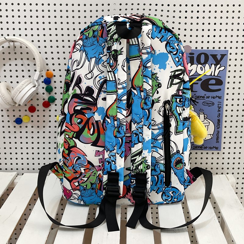 A new high-appearance-level personalized graffiti cool backpack from the Korean version of insi, a color-blocking backpack for junior and senior high school students Application Scenario