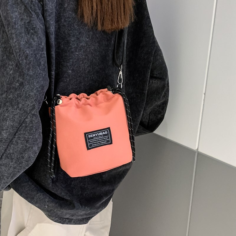 Korean style Instagram streetwear brand personalized crossbody bag with drawstring closure, outdoor sports small bag, cool couple's dancing shoulder bag details Picture