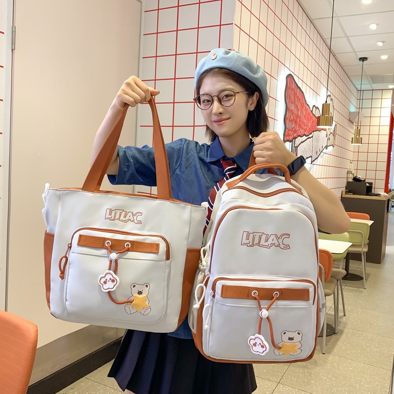New cartoon student schoolbag with high appearance level, girls' backpack, casual student bag for junior high school students, large capacity for girls full figure