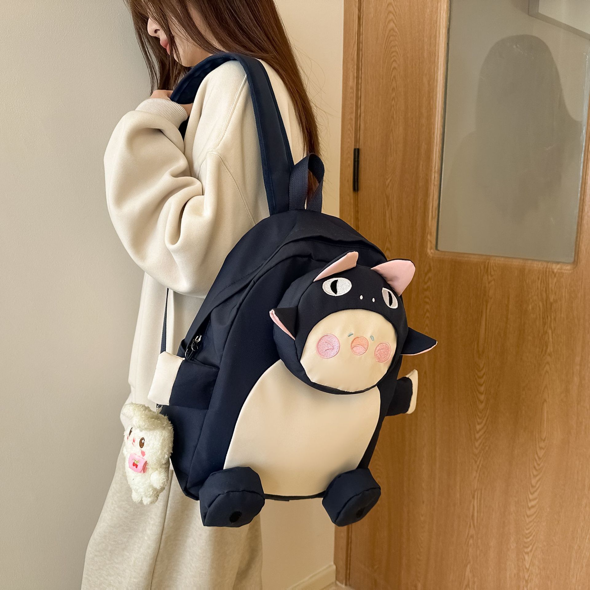 2025 New cute cartoon, ugly and adorable backpack for girls, personalized, creative, niche design sense, spring outing backpack full figure