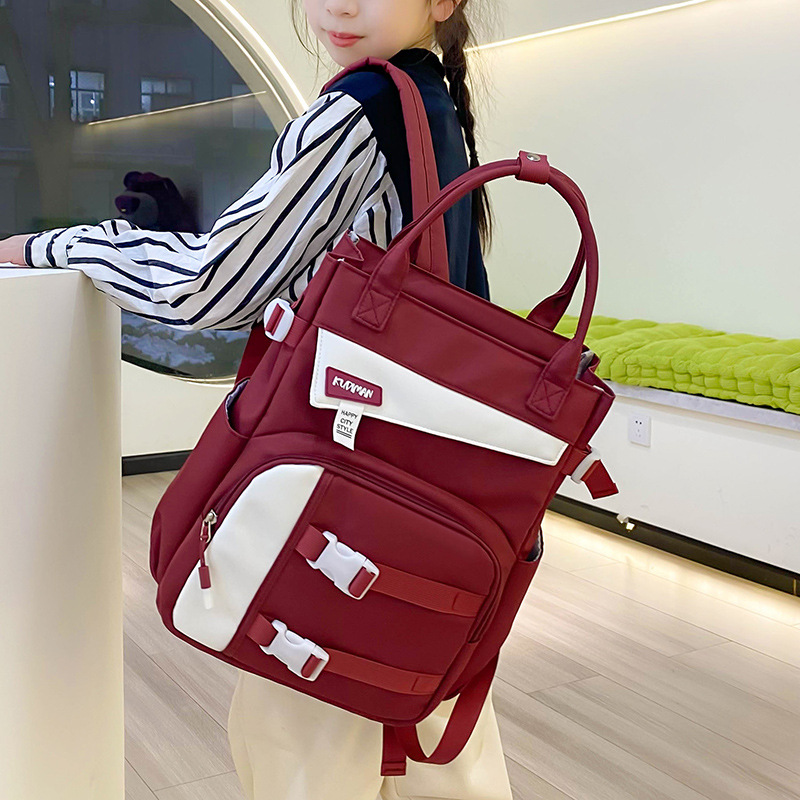 Student tutorial bags, large-capacity back-protecting backpack, boys' and girls' tutorial bags, hand-held homework, art storage and book bags details Picture