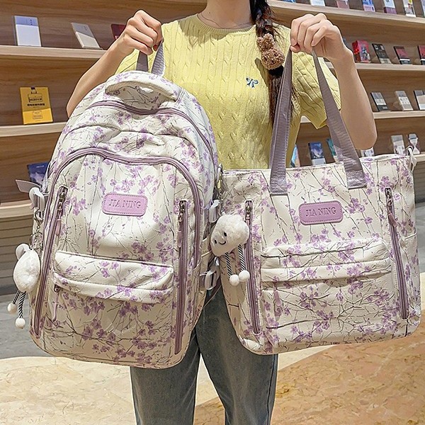 A new Chinese-style backpack with a high level of appearance, fresh and sweet. It is a lightweight and large-capacity backpack for junior and senior high school students details Picture