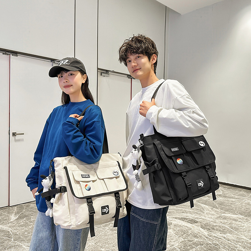 Japanese multi-compartment single-shoulder bag, large-capacity crossbody bag, 2025 new style simple and casual backpack, fashionable after-school bag full figure