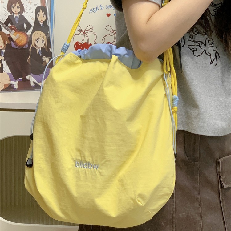 Korean Instagram-style sweet girl single-shoulder bag, summer ice cream color-blocked drawstring, dopamine hand-held crossbody bag details Picture