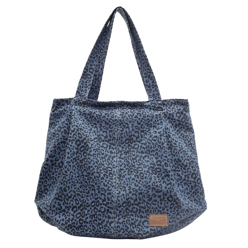 Large-capacity tote bag for women, 2024 new style, casual and laid-back denim, single-shoulder leopard print bag for commuting to school Item Picture
