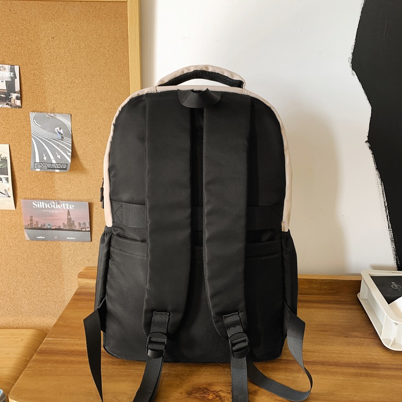 A versatile Japanese-style backpack for college students, a couple's cool and color-blocked computer backpack, and a travel backpack for junior and senior high school students Specification drawing