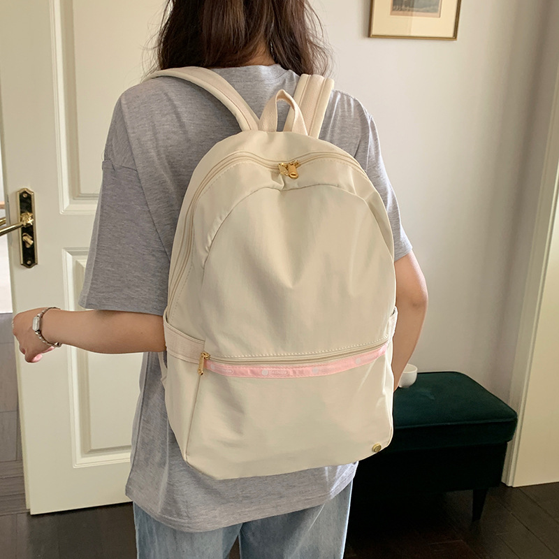 A simple and versatile Japanese Instagram-style casual and lightweight backpack for women. It's stylish and has a high level of appearance. It's a great backpack for best friends to travel and go shopping details Picture