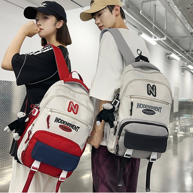 Middle school backpack: Girls' multi-layered color-blocked Hong Kong-style trendy backpack, boys' cool work style high school schoolbag full figure