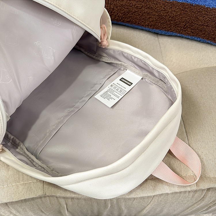 New high-appearanceess-level versatile backpack for college students, embroidered schoolbag, solid color, simple, lightweight and casual backpack Application Scenario