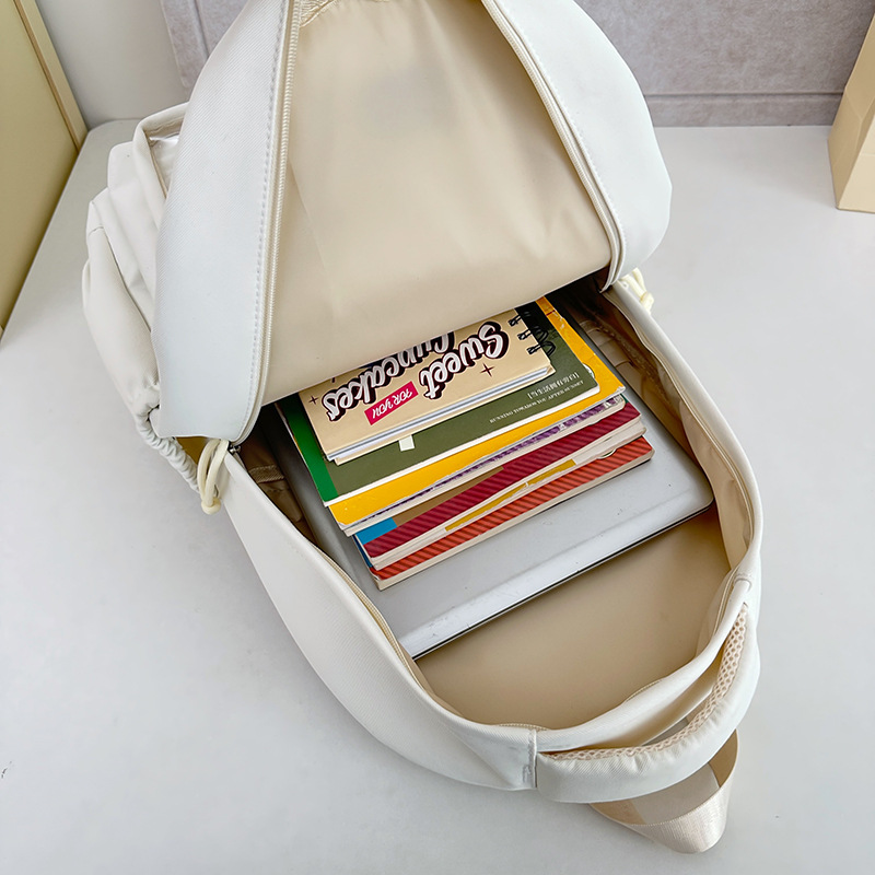A new Korean-style Instagram backpack with a high level of appearance, fresh and sweet candy-colored backpack for junior and senior high school students Application Scenario
