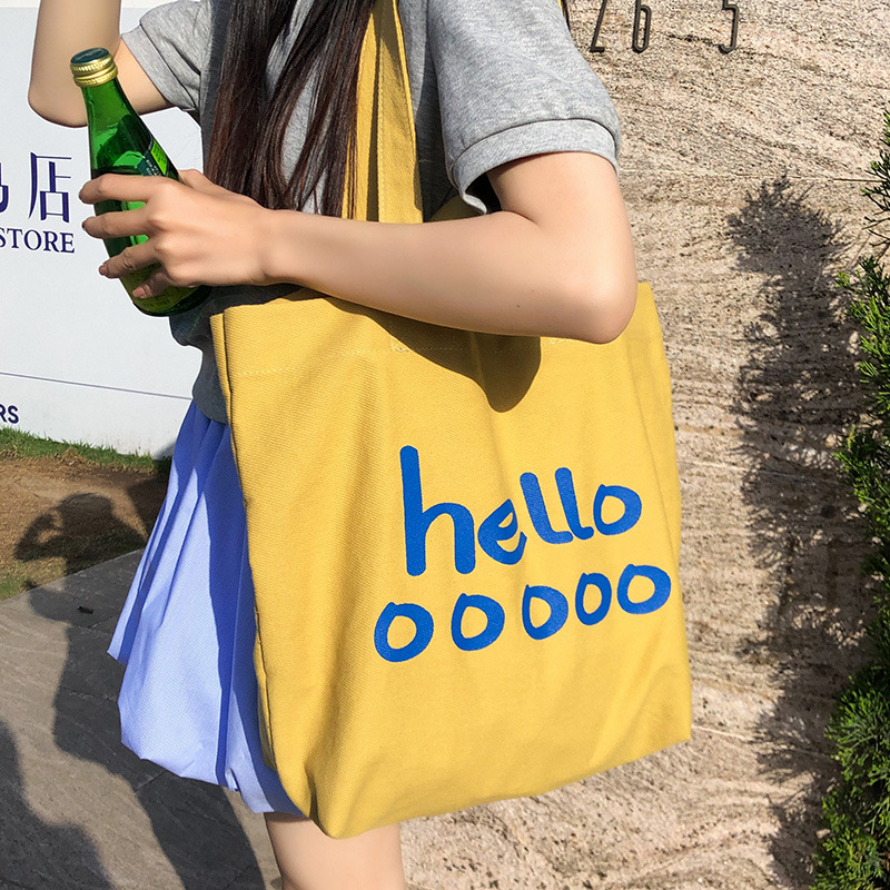 The new Korean version single-shoulder bag features a large capacity, versatile letter tote bag, a simple, casual and trendy bag, and a student shopping bag details Picture