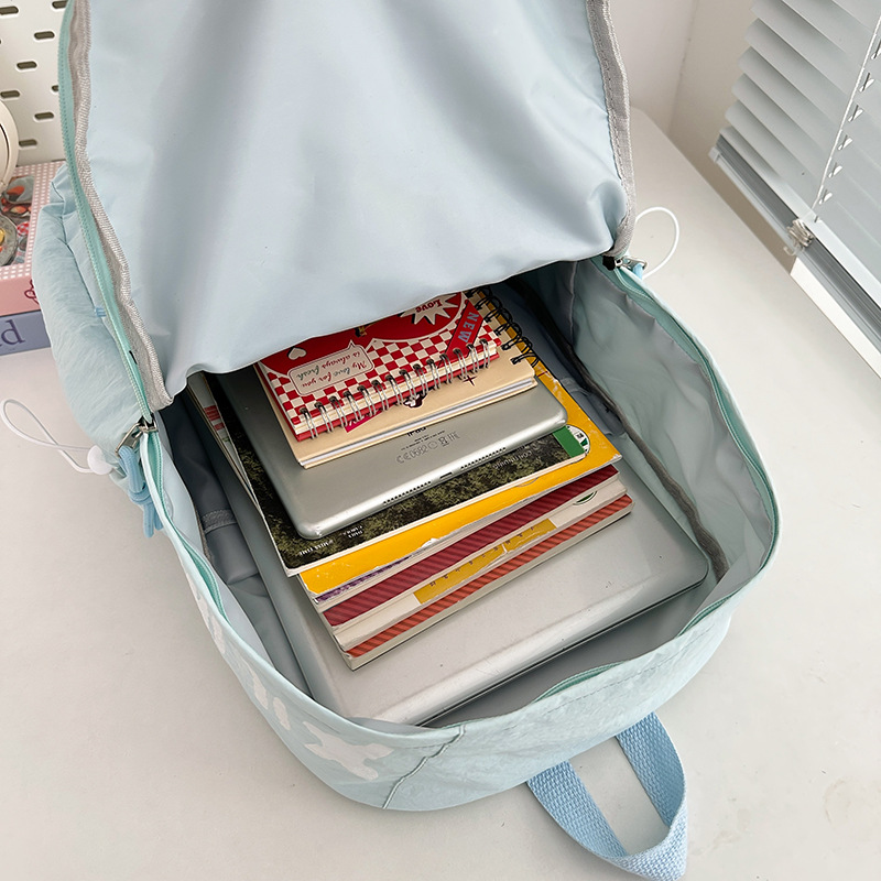 A new high-appearance-level Japanese ins cream candy color fresh and sweet backpack for primary and secondary school students Application Scenario