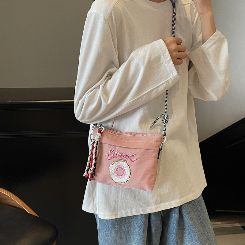 A stylish, artistic, fresh and sweet small shoulder bag with doughnut prints from Korean Instagram, a lightweight crossbody bag for outdoor outings details Picture