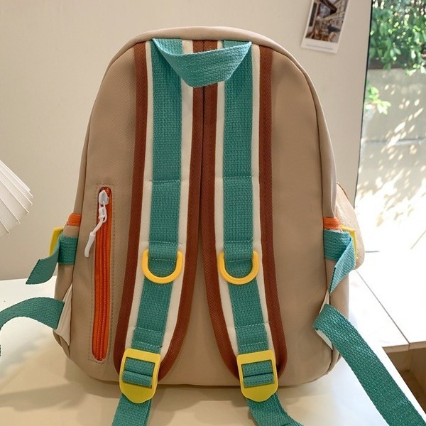 College-style color-blocking small backpack, Japanese-style Instagram fresh and clean children's travel backpack, fashionable mom with kids backpack details Picture