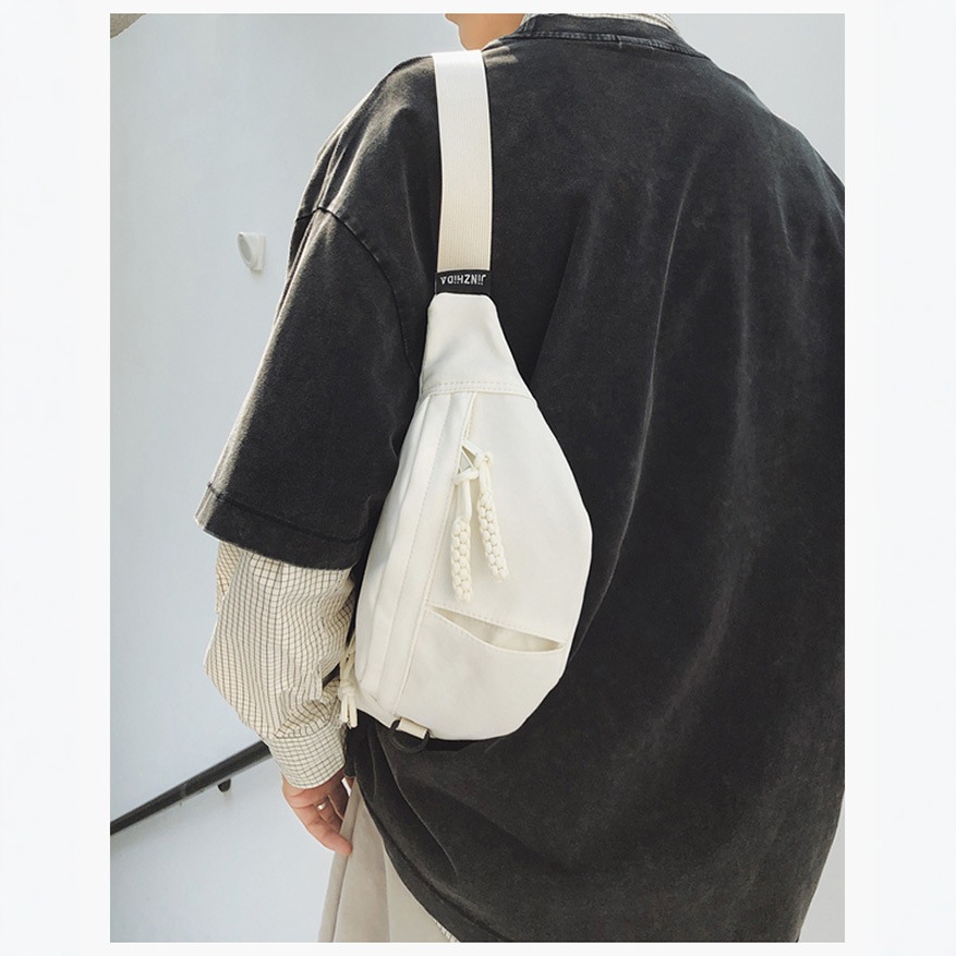 This unisex canvas small bag is simple and versatile. The chest bag has a large capacity and a sense of design. The crossbody bag is fashionable and stylish full figure