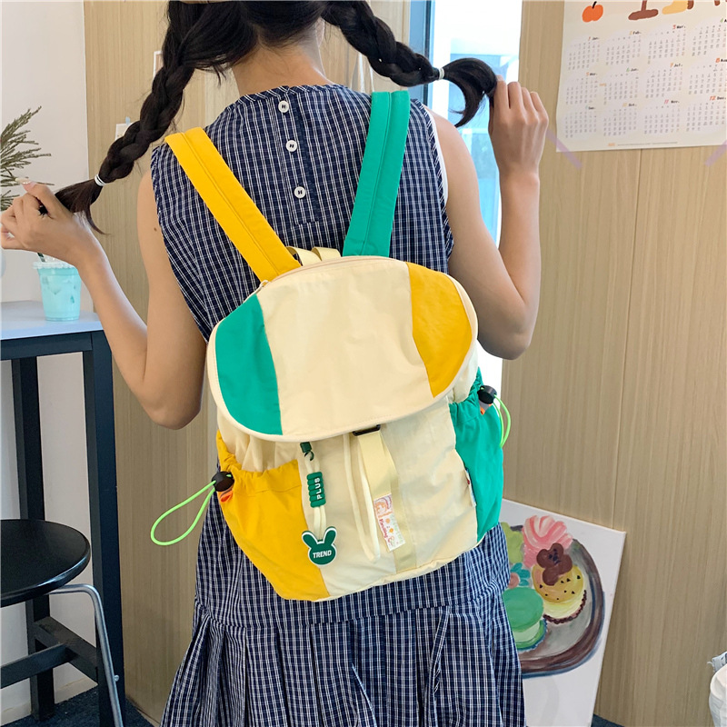 New fashionable color-blocking canvas bag for college students in class, new large-capacity schoolbag and backpack for women in 2025 full figure
