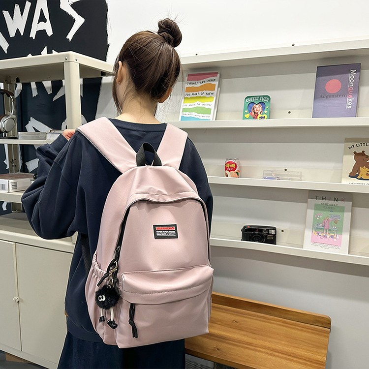 The 2025 new style fashionable backpack is a simple and large-capacity travel backpack for men and a cute and casual Korean-style schoolbag for women full figure