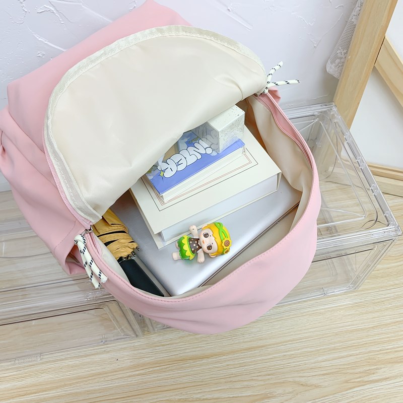 The new Japanese-style ins simple and casual small schoolbag is a lightweight backpack for high school girls with a college-style appearance Application Scenario
