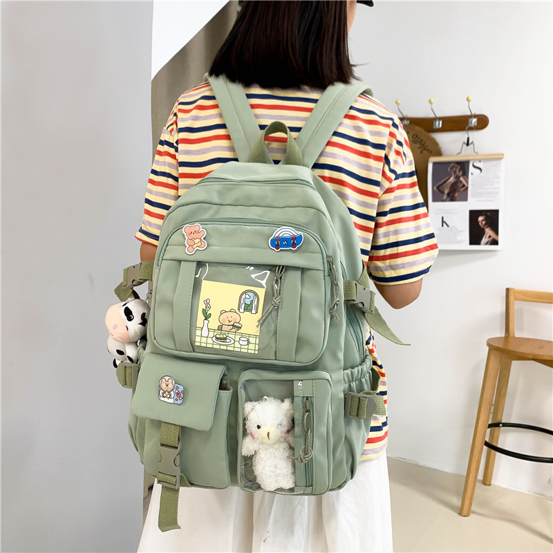 New Korean-style fashionable backpacks for girls, trendy backpacks for students in grades three to six, and wholesale backpacks for junior high school students full figure