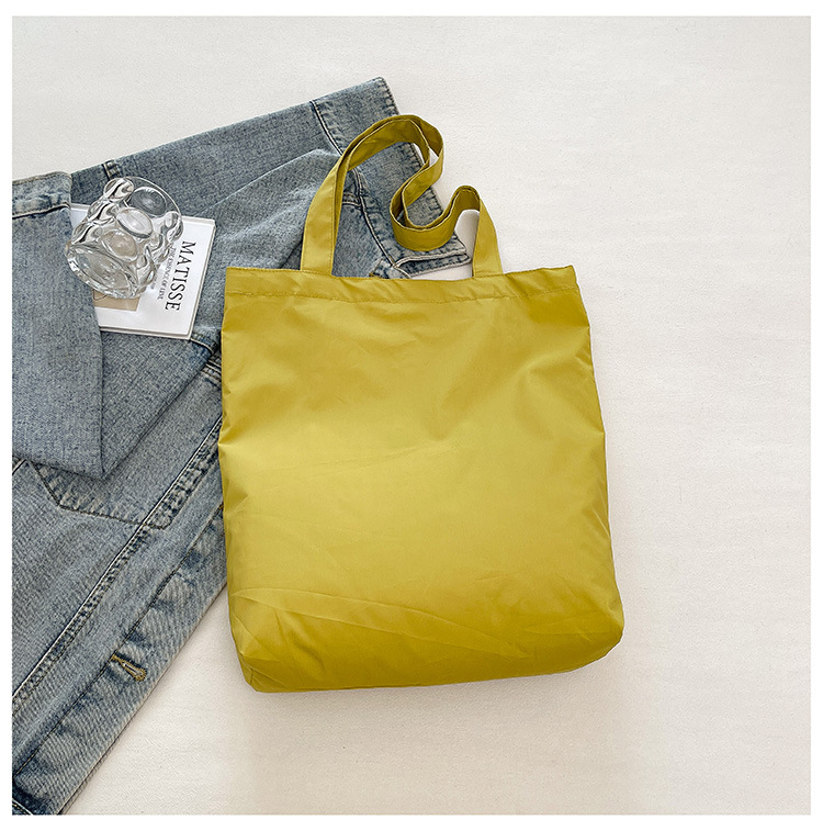 A new high-appeal, fresh and simple letter-printed handbag for women. It's a versatile and large-capacity crossbody bag for work and commuting Specification drawing