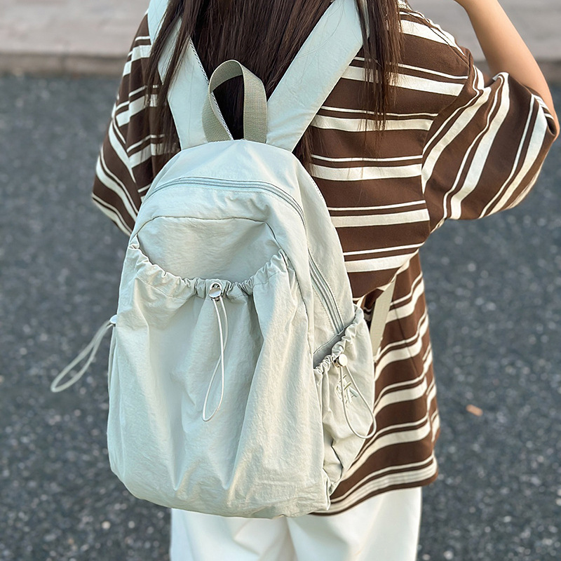 The new Korean-style ins solid-color drawstring backpack is a casual, simple, lightweight and large-capacity travel backpack for junior and senior high school students details Picture