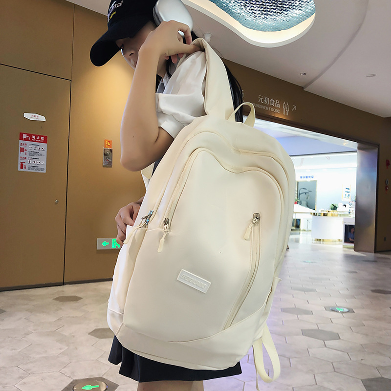 A new solid-color Korean-style casual backpack for junior high school students in an ins style details Picture