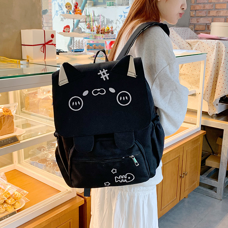 2025 New Japanese-style cute printed kitten backpack, large-capacity versatile schoolbag, casual and simple travel backpack details Picture
