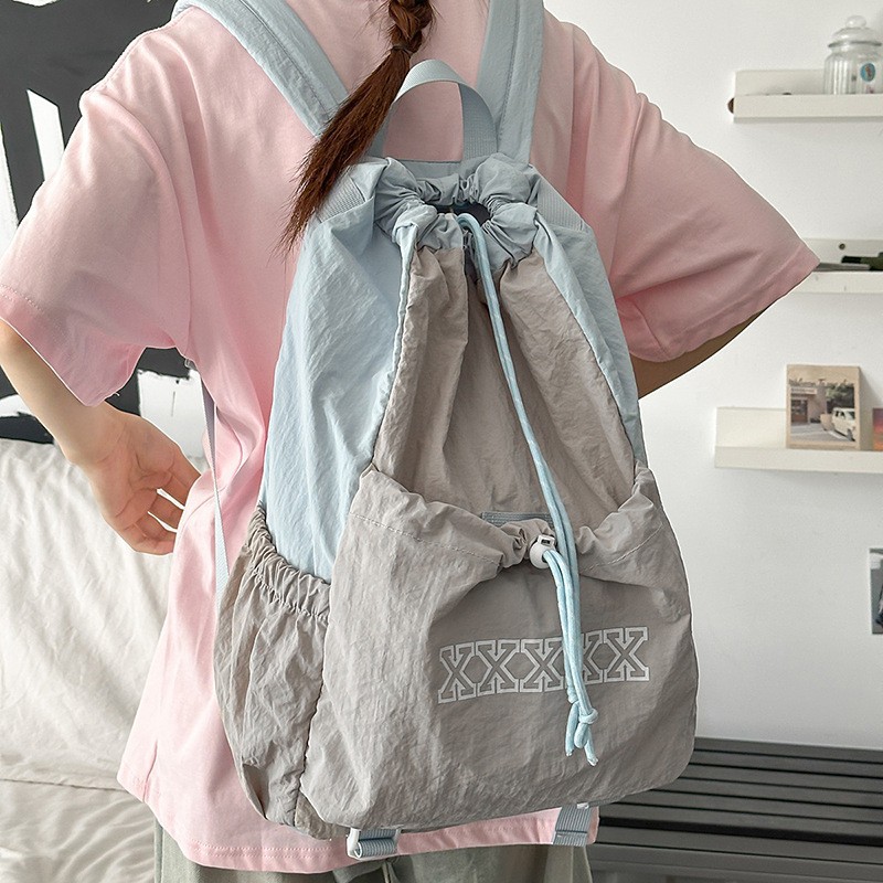 The new forest-themed ins badminton backpack with a high aesthetic level, fresh and sweet, drawstring opening, and a color-blocking lightweight backpack details Picture